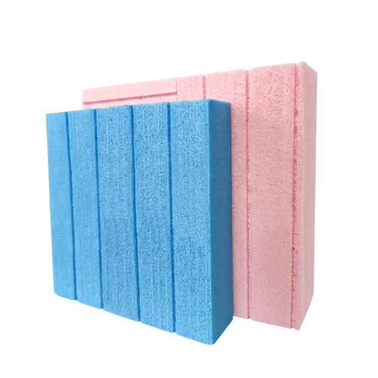 Blue and pink XPS extruded polystyrene foam insulation board samples with surface grooves