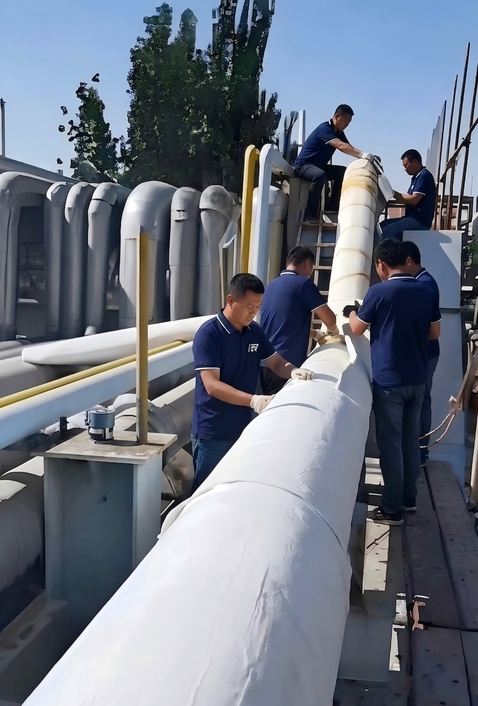 Professional installation of silica aerogel blankets on industrial pipelines at Nanjing Chemical Industrial Park