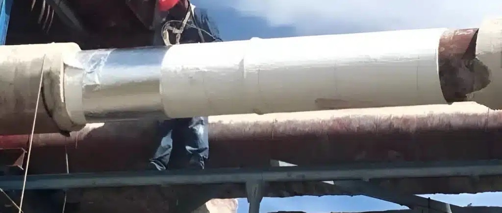 Industrial pipe insulation cladding using silica aerogel blankets and aluminum foil protective layering